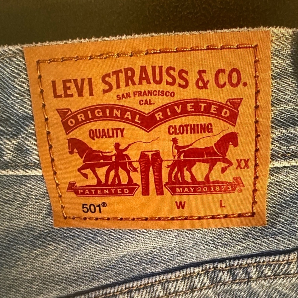 Levi's Light Wash Frayed Hem Denim Shorts - Picture 3 of 8